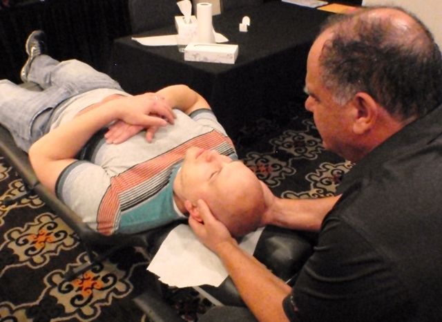 A doctor practicing the endonasal balloon release during training