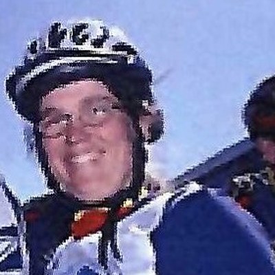 Jenny Mountz on her bike, in a cycling helmet